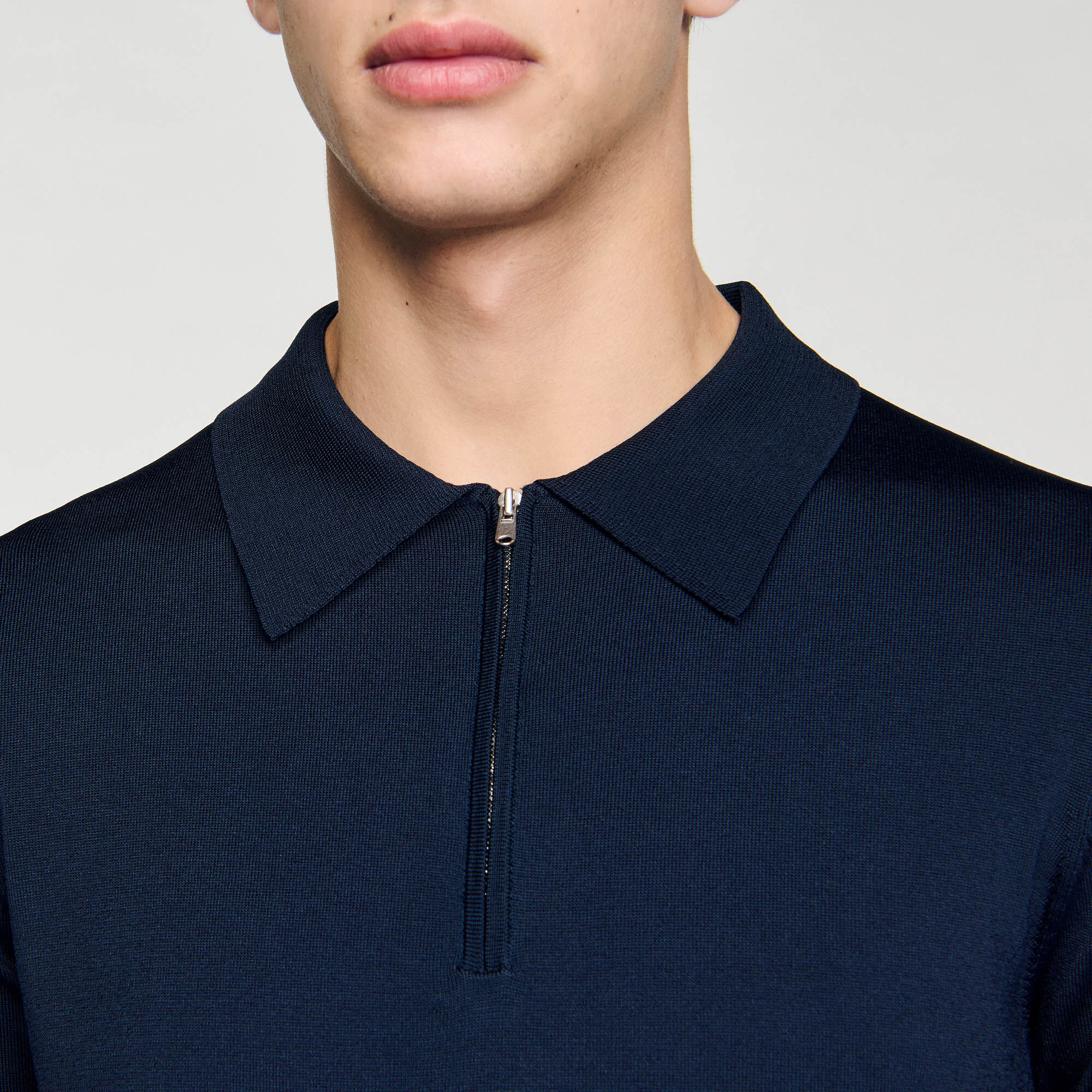 Polo en maille à col zippé