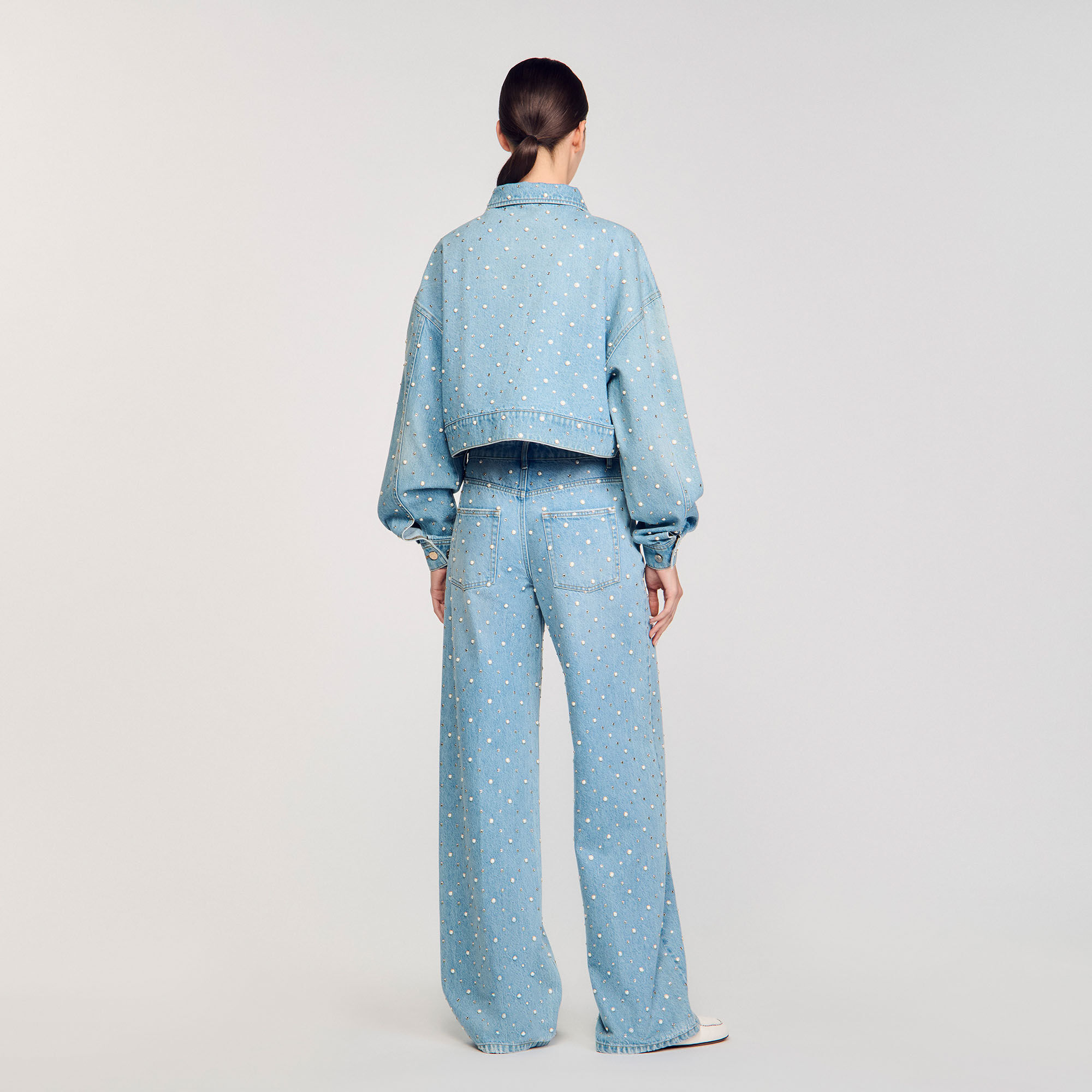 Blouson en jean strassé et perlé