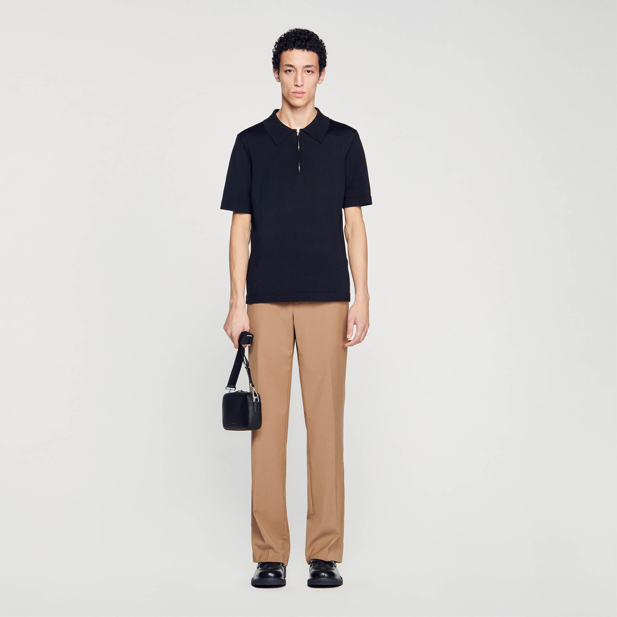 Polo en maille à col zippé