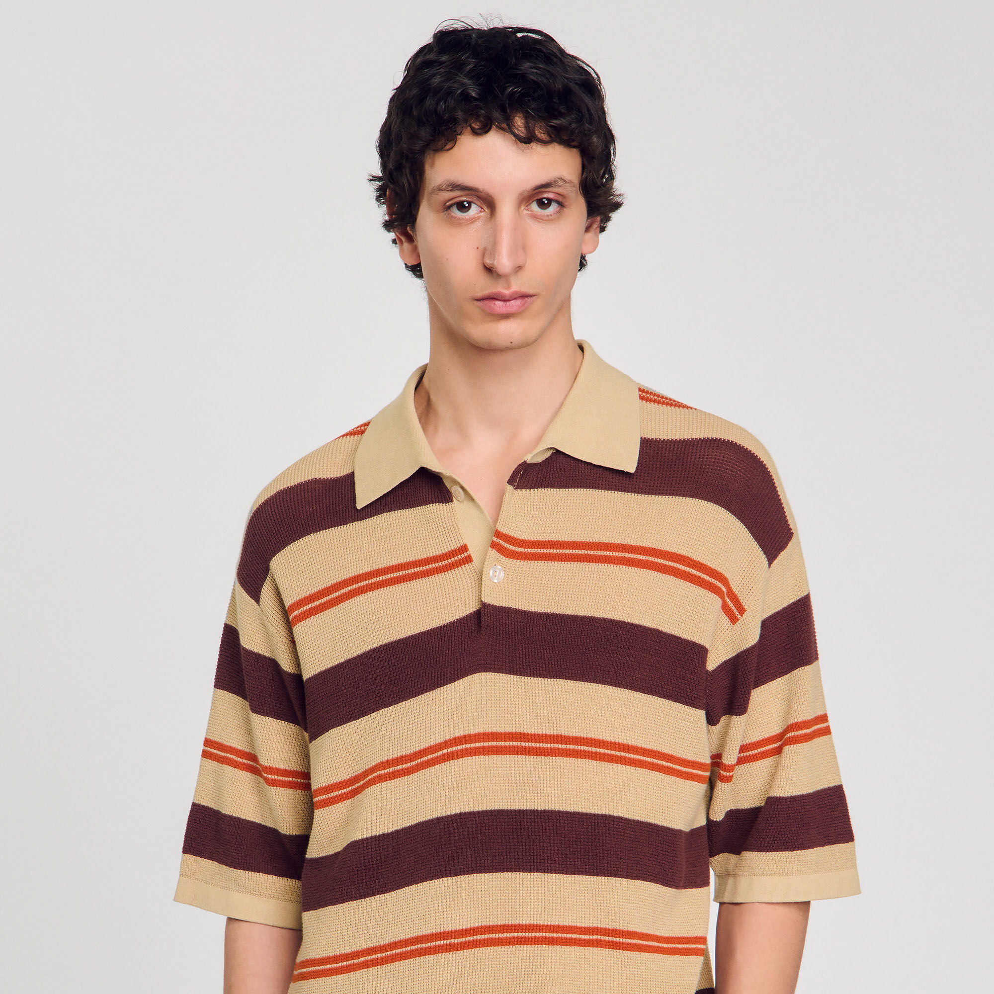 Polo rayé en maille